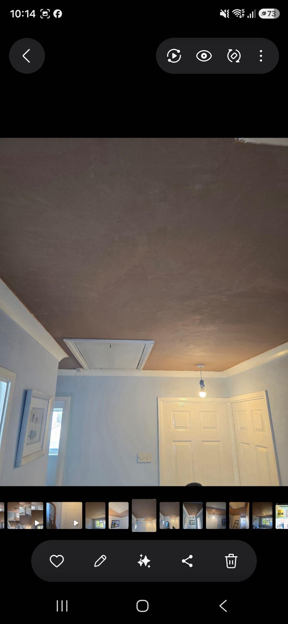 Plastered ceiling around a loft hatch